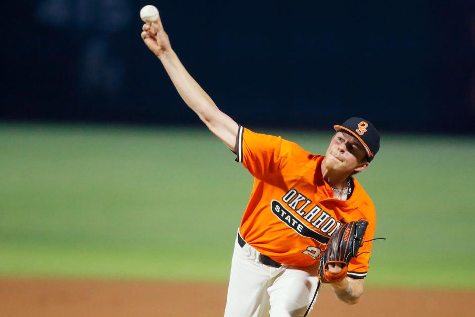 Oklahoma Sate's Justin Campbell (27) pitches during a bedlam college baseball game in the Big 12 tournament between the University of Oklahoma Sooners (OU) and the Oklahoma State Cowboys (OSU) at Chickasaw Bricktown Ballpark in Oklahoma City, Wednesday, May 26, 2021.