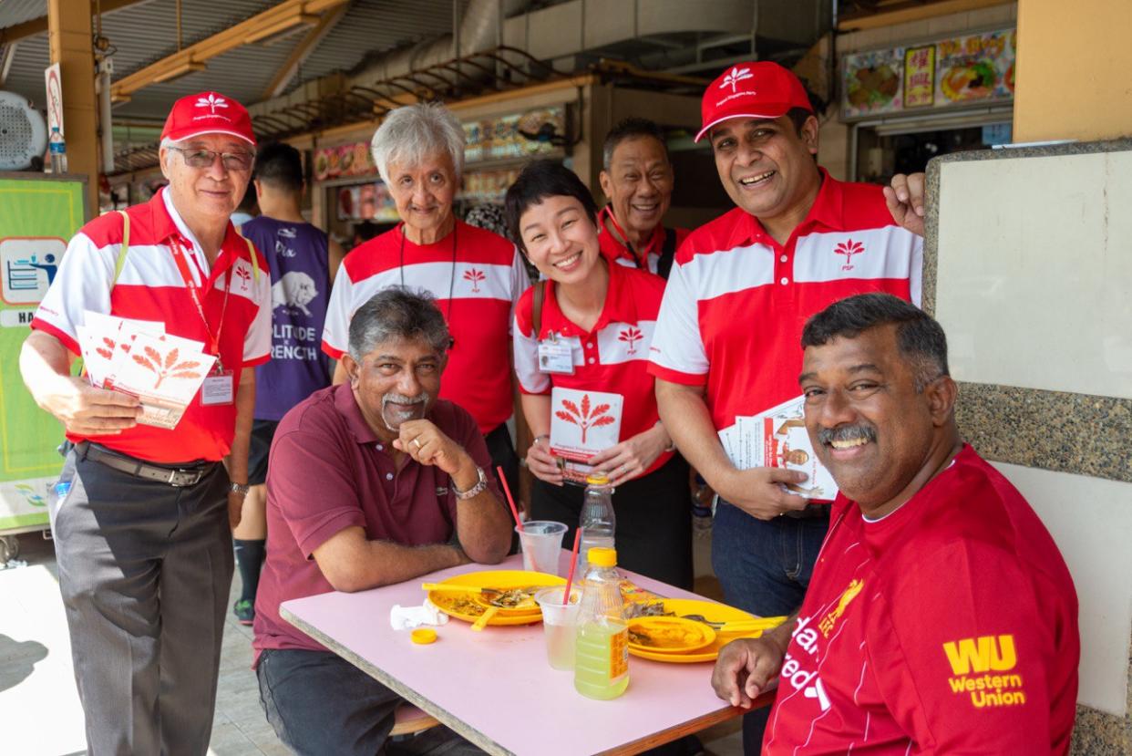 Opposition politician Ravi Philemon (standing, first from right) has resigned from Progress Singapore Party. (PHOTO: Facebook/Progress Singapore Party)