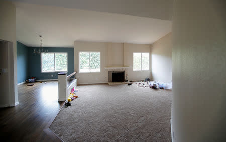 Toys lie scattered in the sparsely furnished room of the new home of a military family who have had to move out of their mold-infested military housing at Camp Pendleton to off-base housing in Carlsbad, California, U.S. September 26, 2018. REUTERS/Mike Blake