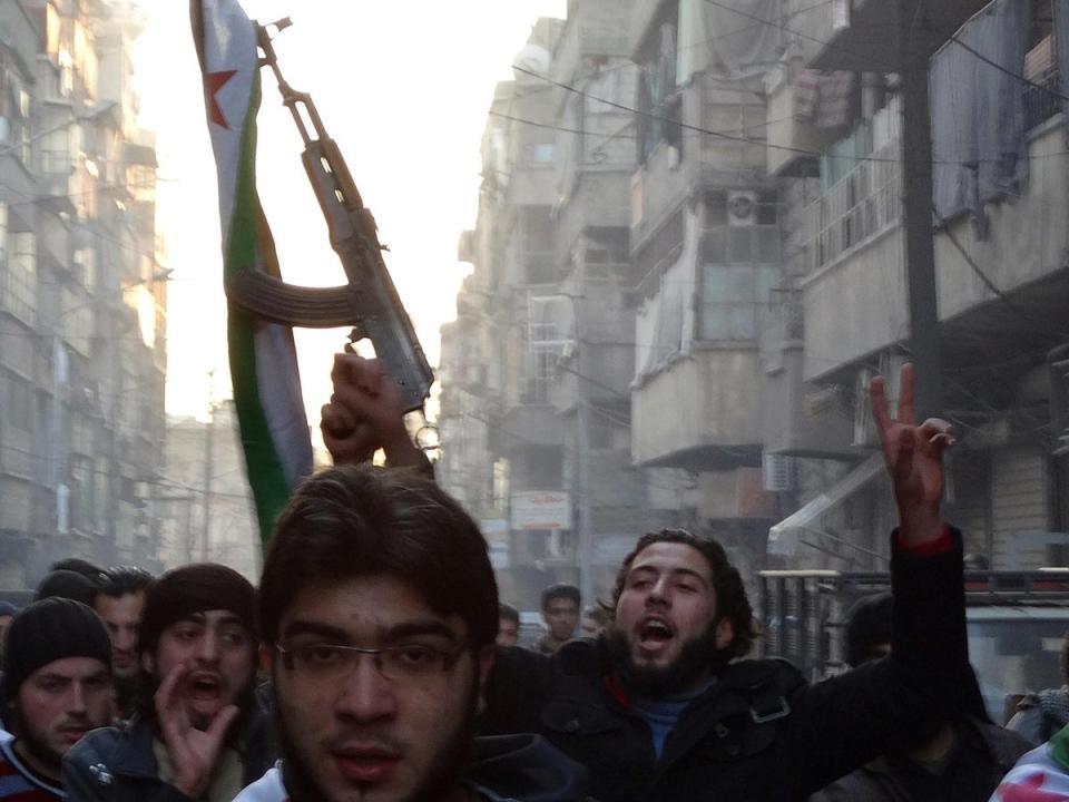 ISIS began as a group by the merging of extremist organisations ISI and al-Nusra in 2013.Following clashes, Syrian rebels captured the ISIS headquarters in Aleppo in January 2014 (pictured) (AFP/Getty)