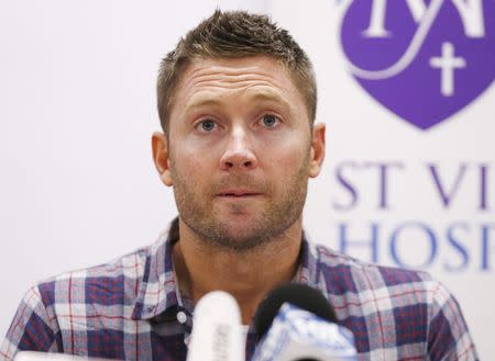 Australian cricket captain Michael Clarke delivers a statement, on behalf of the family of deceased teammate Phillip Hughes, at St Vincent's Hospital in Sydney, November 27, 2014. REUTERS/Jason Reed