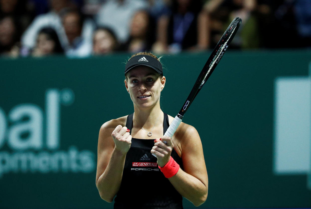 Germany’s Angelique Kerber celebrates after winning her match against Naomi Osaka at the WTA Finals Singapore. (PHOTO: Reuters/Edgar Su)