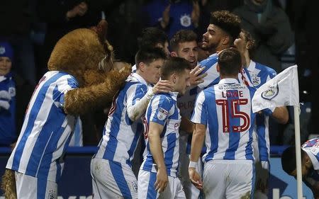 Britain Football Soccer - Huddersfield Town v Reading - Sky Bet Championship - The John Smith's Stadium - 21/2/17 Philip Billing (R) celebrates with team mates and the club mascot after scoring the first goal for Huddersfield Town Mandatory Credit: Action Images / Ed Sykes Livepic