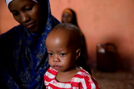 The Wider Image: Tanzania's Zanzibar begins to register traditional healers