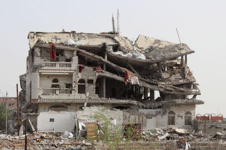 A view of a building destroyed by a Saudi-led air strike is seen in Haradh city of Yemen's northwestern province of Hajja May 20, 2015. REUTERS/Stringer