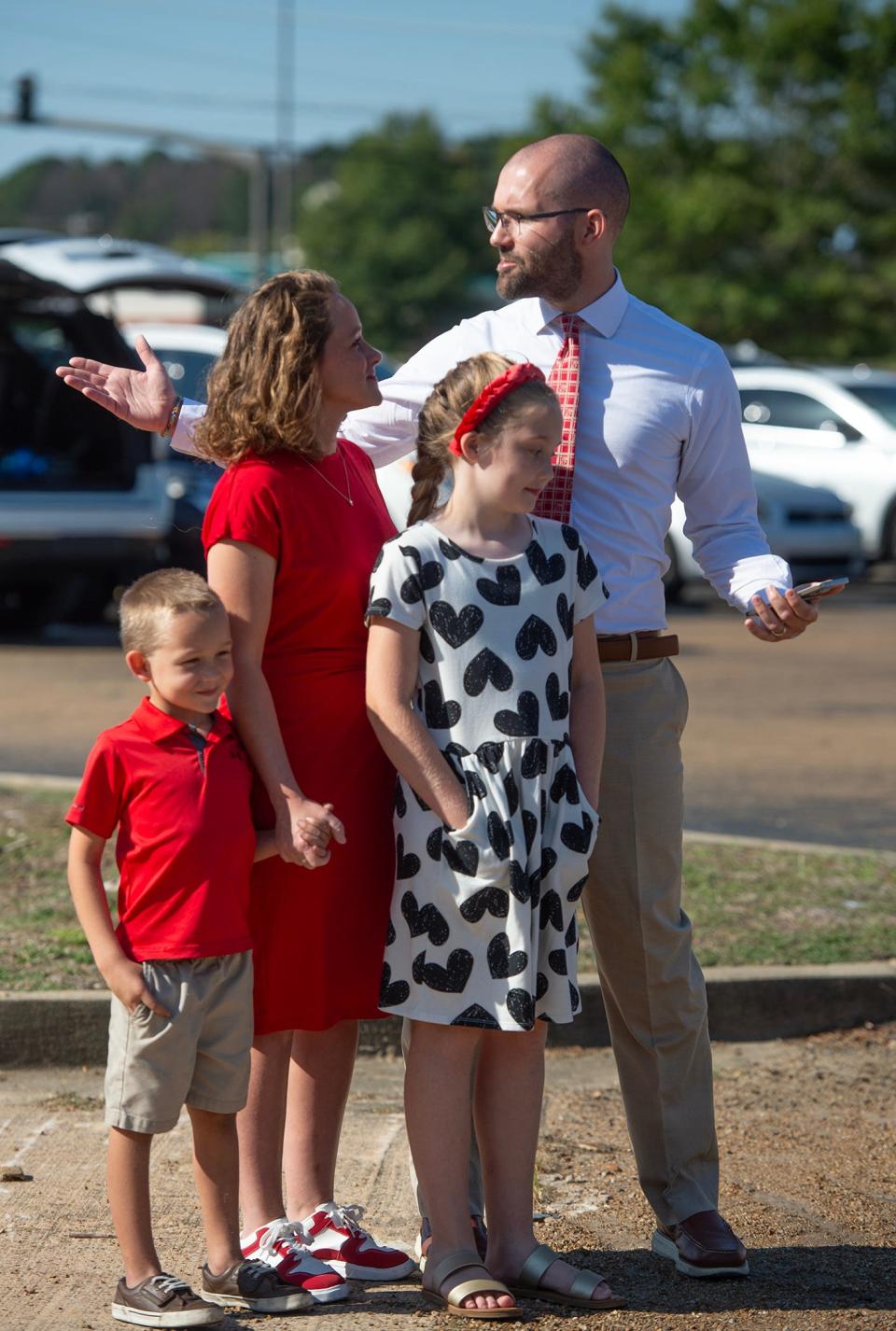 Franchise owner Ian Hodges and his family, wife Ryan Hodges, son Levi Hodges, 6, daughter Leah Hodges, 9, address a crowd gathered to celebrate the groundbreaking for a new Chick-fil-A location on Lakeland Drive in Flowood on Wednesday.