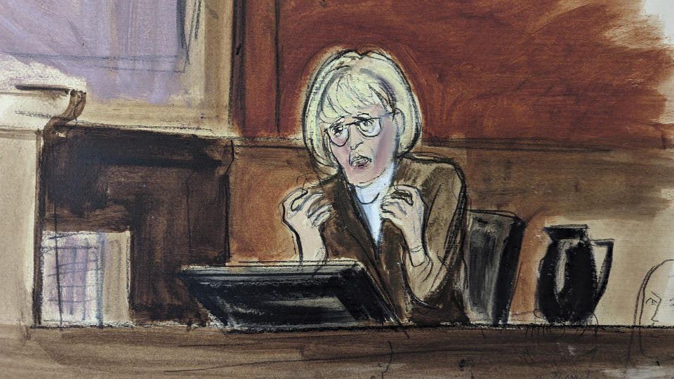 In this courtroom sketch, E. Jean Carroll testifies on the witness stand in Federal Court, in New York, Wednesday, Jan. 17, 2024. Carroll stated that Donald Trump's vitriol toward her has not ceased, pointing to multiple social media posts he made about her in recent days, and that his rhetoric continues to inspire venom against her from strangers because she claimed he sexually abused her decades ago. (Elizabeth Williams via AP)