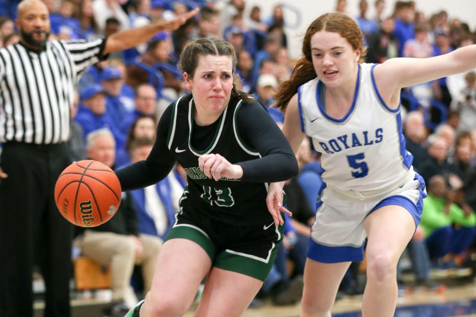 Zionsville Emma Haan (13) tries to get around Hamilton Southeastern Kayla Brinley (5) as Zionsville takes on Hamilton Southeastern High School in the S8 IHSAA Class 4A Girls Basketball State Semi-finals; Feb 2, 2024; Fishers, IN, USA; at Hamilton Southeastern High School.