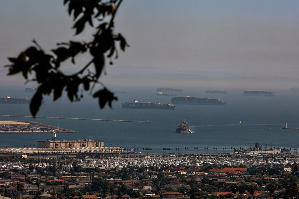 SAN PEDRO, CA - OCTOBER 13: The Port of Los Angeles is backed up with a growing number of incoming cargo ships waiting offshore as the port is set to begin operating around the clock on Wednesday, Oct. 13, 2021 in San Pedro, CA. (Jason Armond / Los Angeles Times via Getty Images)