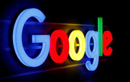 FILE PHOTO: An illuminated Google logo is seen inside an office building in Zurich September 5, 2018. REUTERS/Arnd WIegmann/File Photo