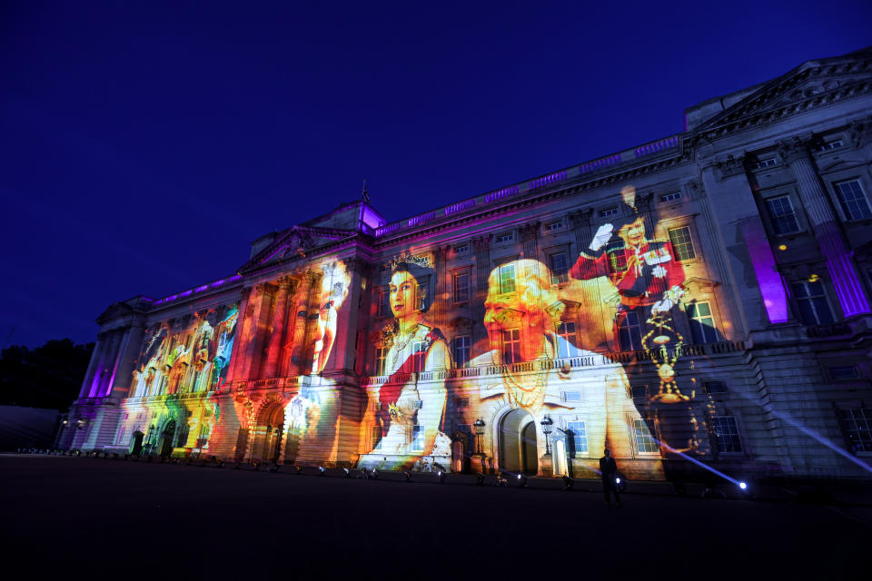 <p>Projections displayed on the front of Buckingham Palace during The Lighting Of The Principal Beacon on day one of the Platinum Jubilee celebrations. More than 3,000 towns, villages and cities throughout the UK, Channel Islands, Isle of Man and UK Overseas Territories, and each of the capital cities of Commonwealth countries lit beacons to mark the Jubilee. (PA)</p> 