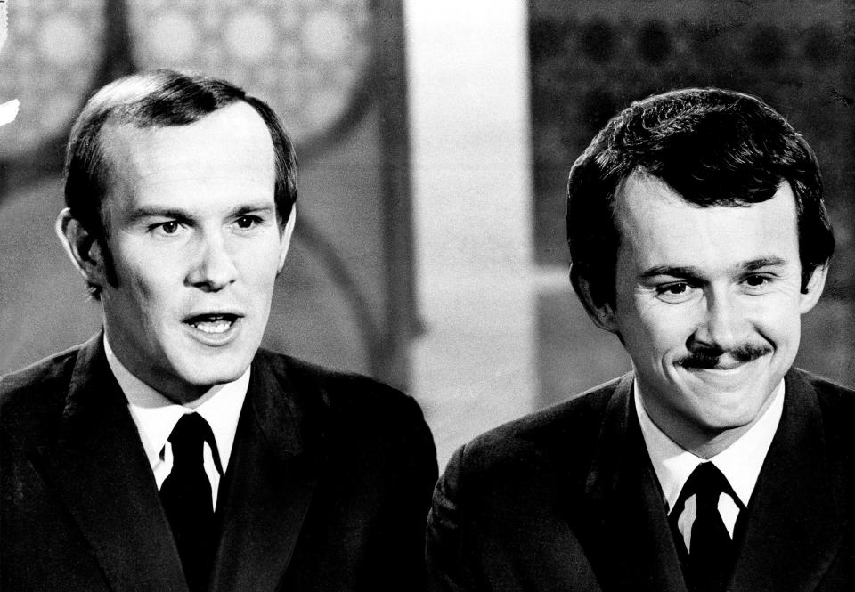 Comedians Tommy, left, and Dick Smothers are shown on April 5, 1969. Their often raucous variety show was canceled by CBS in 1969 after the network grew uncomfortable with social commentary, including opposition to the Vietnam War.