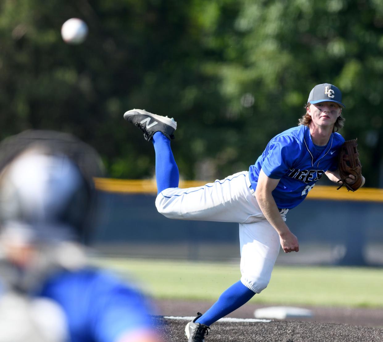 Lake Center Christian's Dylan Maninga delivers a pitch against Tiffin Calvert in the second inning of a Division IV baseball regional semifinal, Thursday, June 1, 2023, at Louisville.