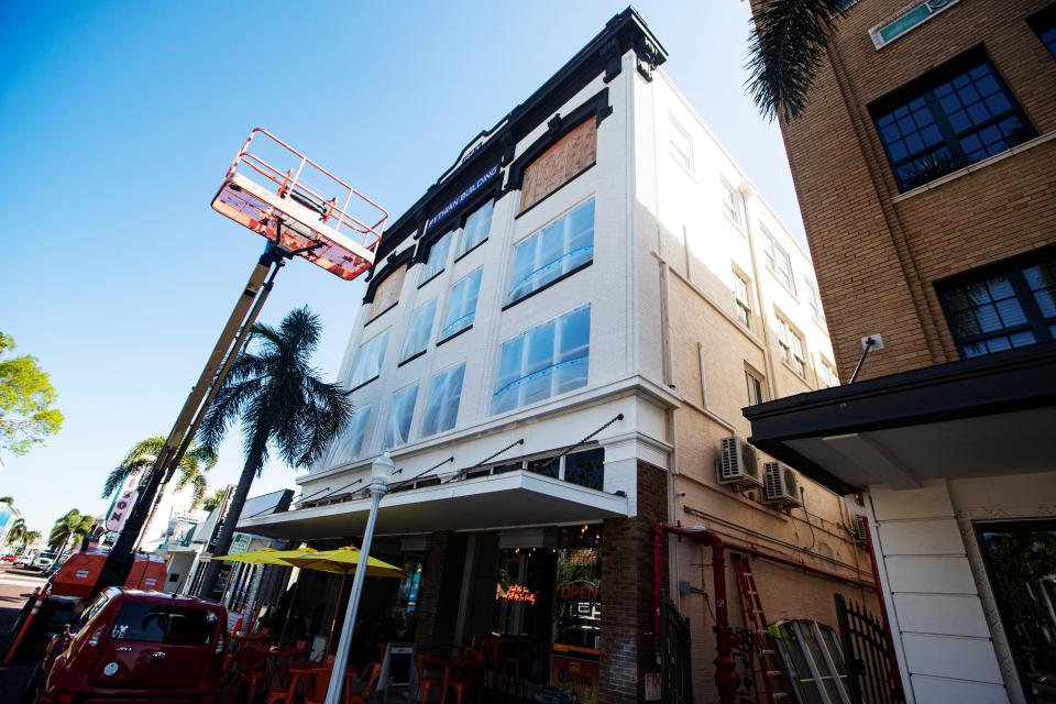 The Pythian building (formerly known as the Richards building) is seen on Hendry Street in downtown Fort Myers on Tuesday, April 23, 2024. The more than 100-year-old building, made of brick was recently painted white with black trim by the owners. Some historians are furious that it was painted, in violation of the cityÕs historic preservation ordinance and a stop-work order.