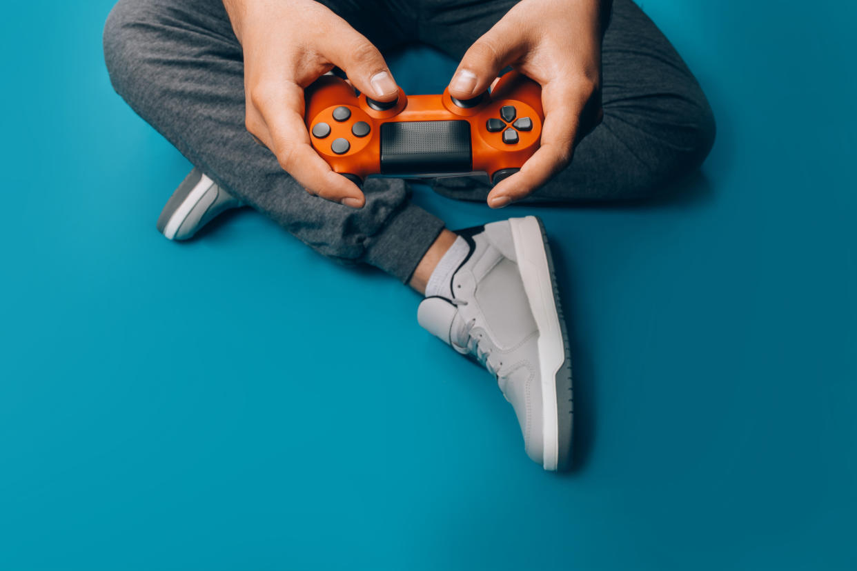 Cop a squat and get in on these killer gaming deals.  (Photo: Getty)