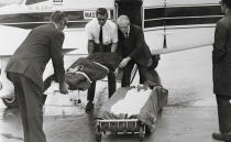 The body of Mary Jo Kopechne, former employee of the late Sen. Robert F. Kennedy, is removed from a charter plane at Wilkes-Barre-Scranton airport and taken to a Plymouth, Pa. funeral home. Miss Kopechne died July18, 1969, at Edgartown, Martha’s Vineyard in a car driven by Sen. Edward M. Kennedy, after it plunged into an island pond. (Photo: Bettmann/Getty Images)