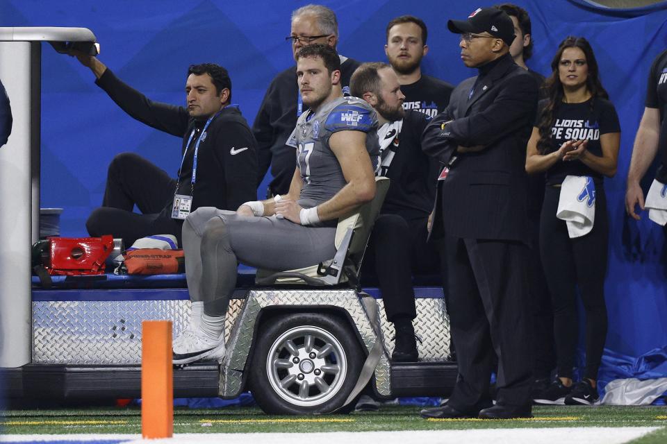 Sam LaPorta of the Detroit Lions gets carted off after a knee injury during the first half against the Minnesota Vikings at Ford Field on Jan. 7, 2024, in Detroit.