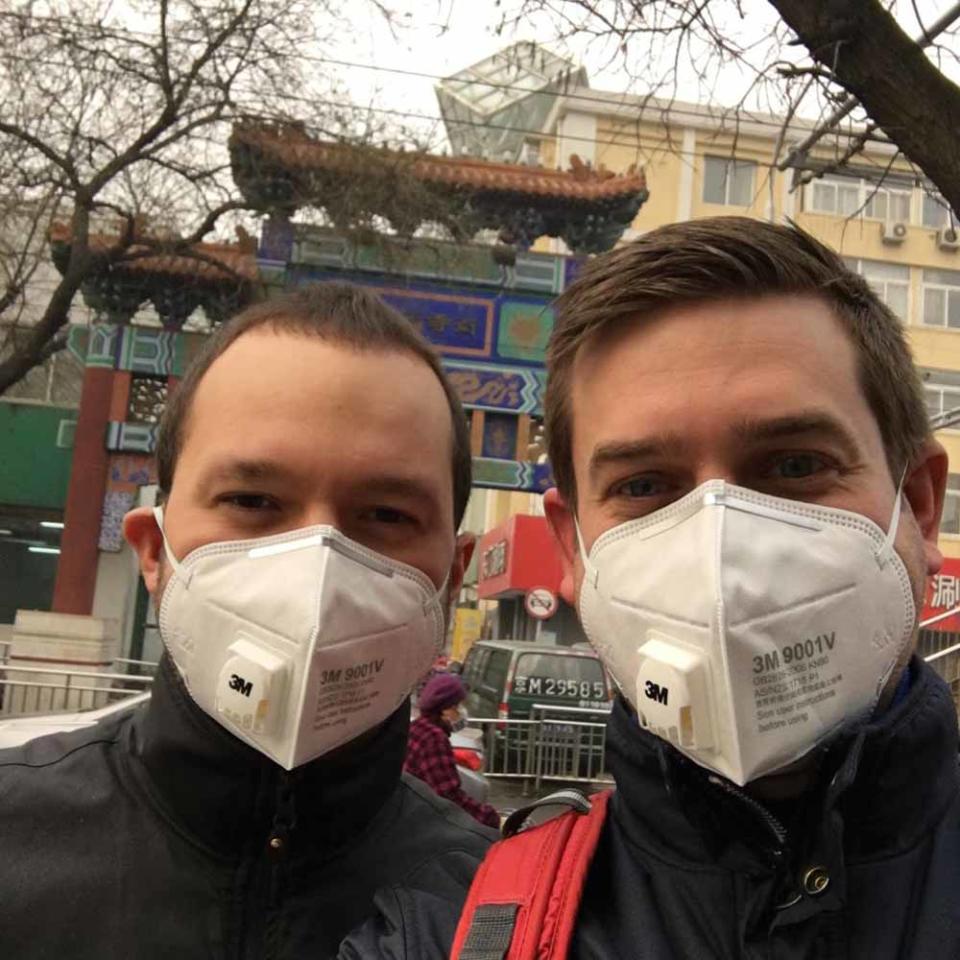 Edvin with his husband, Ola, in China (Collect/PA Real Life).