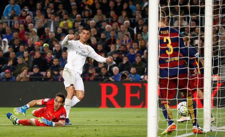 Football Soccer - FC Barcelona v Real Madrid - La Liga - Camp Nou, Barcelona - 2/4/16 Real Madrid's Cristiano Ronaldo scores their second goal Reuters / Juan Medina Livepic