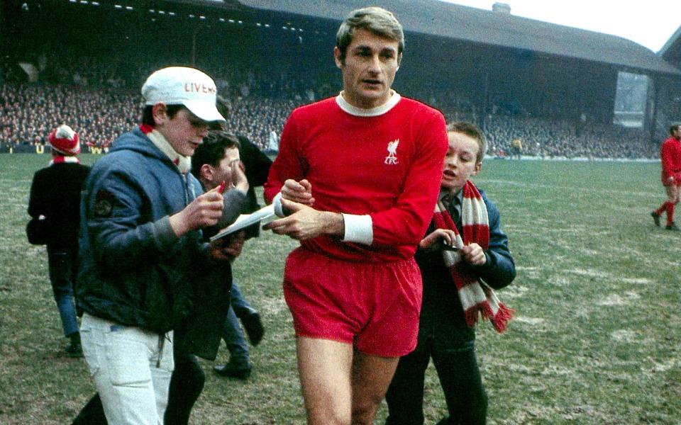 Roger Hunts signs autographs for fans following a clash between Liverpool and Burnley at Anfield in 1969 - Getty Images