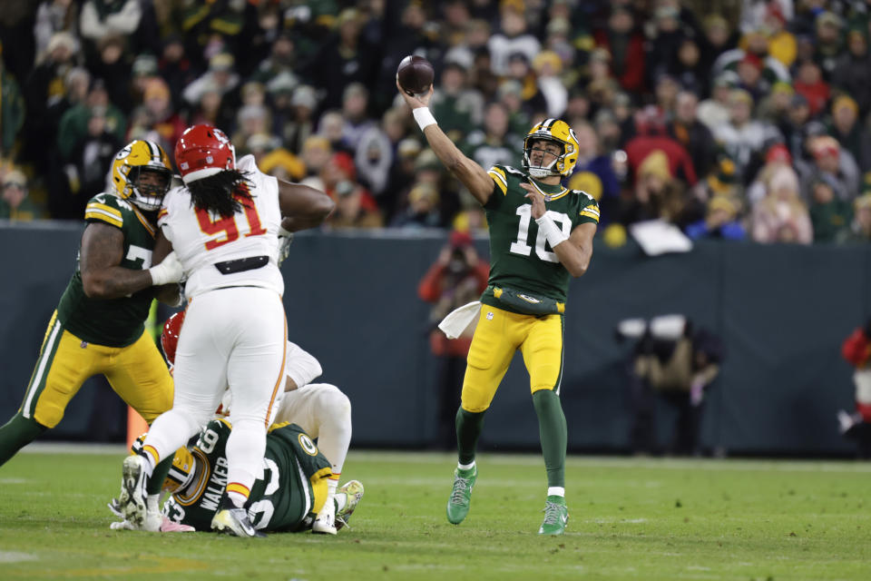 Green Bay Packers quarterback Jordan Love (10) throws against the Kansas City Chiefs during the first half of an NFL football game Sunday, Dec. 3, 2023 in Green Bay, Wis. (AP Photo/Matt Ludtke)