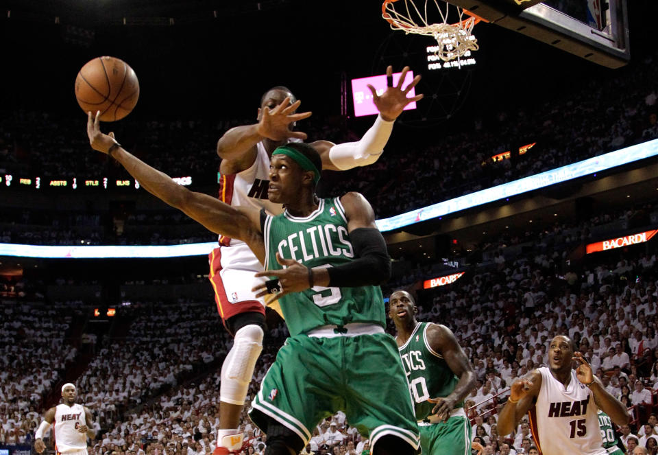 Rajon Rondo #9 of the Boston Celtics goes up for a shot over his head against Dwyane Wade #3 of the Miami Heat in the second quarter in Game Seven of the Eastern Conference Finals in the 2012 NBA Playoffs on June 9, 2012 at American Airlines Arena in Miami, Florida. (Photo by Mike Ehrmann/Getty Images)