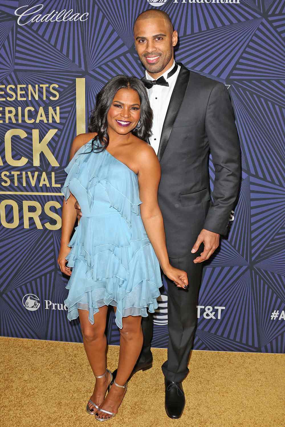 BEVERLY HILLS, CA - FEBRUARY 17: Actress Nia Long (L) and her Husband Ime Udoka (R) attend the BET's 2017 American Black Film Festival Honors Awards at The Beverly Hilton Hotel on February 17, 2017 in Beverly Hills, California. (Photo by Paul Archuleta/FilmMagic)
