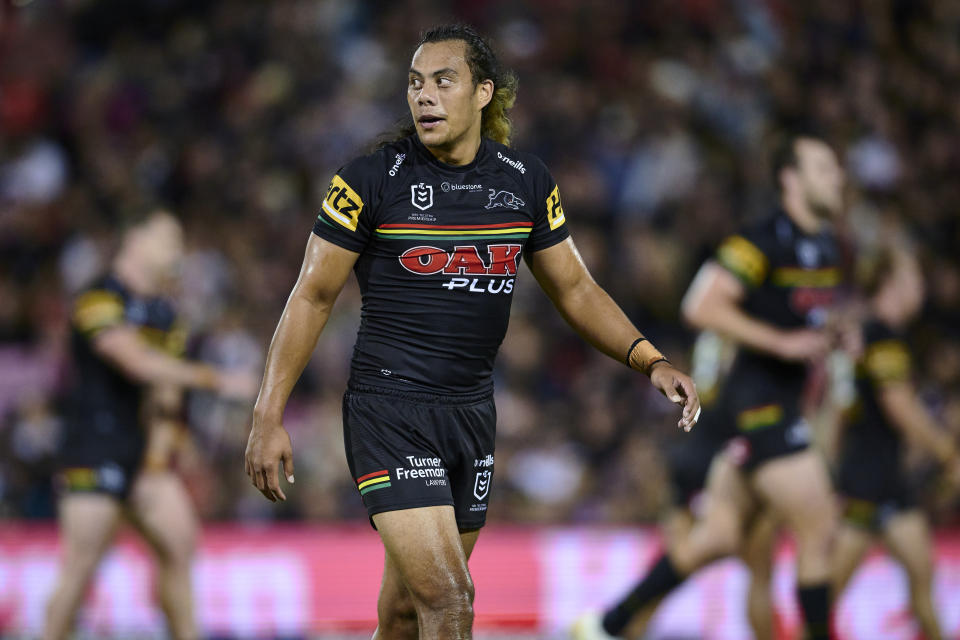 Jarome Luai looking on during an NRL game.