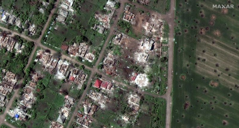 A satellite image shows destroyed homes and buildings from artillery bombardments, in Popasna