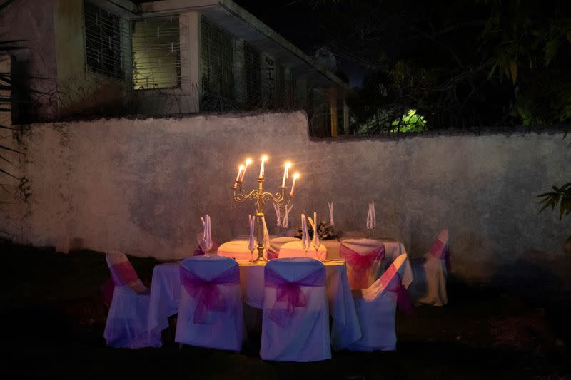 The Wider Image: Haiti's brides beat hurricanes, power cuts and protests to wed in style