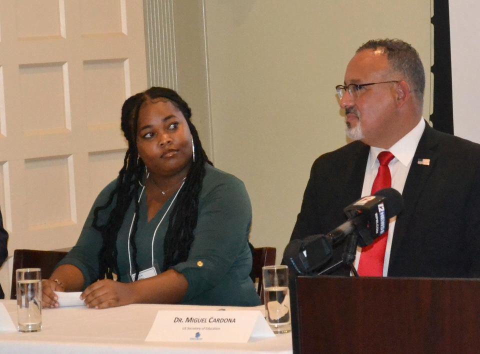 Dellicia Allen, a Newport public education student, listens to the conversation alongside U.S. Secretary of Education Dr. Miguel Cardona during a summit Monday at the International Tennis Hall of Fame.