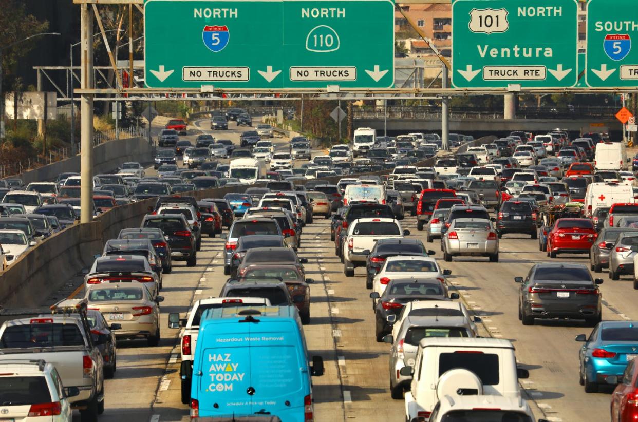 <span class="caption">It's back: Rush-hour traffic in Los Angeles on June 15, 2021.</span> <span class="attribution"><a class="link " href="https://www.gettyimages.com/detail/news-photo/los-angeles-californiajune-15-2021traffic-has-returned-to-news-photo/1233490475" rel="nofollow noopener" target="_blank" data-ylk="slk:Carolyn Cole / Los Angeles Times via Getty Images;elm:context_link;itc:0;sec:content-canvas"><span class="caas-xray-inline-tooltip"><span class="caas-xray-inline caas-xray-entity caas-xray-pill rapid-nonanchor-lt" data-entity-id="Carolyn_Cole" data-ylk="cid:Carolyn_Cole;pos:1;elmt:wiki;sec:pill-inline-entity;elm:pill-inline-text;itc:1;cat:VisualArtist;" tabindex="0" aria-haspopup="dialog"><a href="https://search.yahoo.com/search?p=Carolyn%20Cole" data-i13n="cid:Carolyn_Cole;pos:1;elmt:wiki;sec:pill-inline-entity;elm:pill-inline-text;itc:1;cat:VisualArtist;" tabindex="-1" data-ylk="slk:Carolyn Cole;cid:Carolyn_Cole;pos:1;elmt:wiki;sec:pill-inline-entity;elm:pill-inline-text;itc:1;cat:VisualArtist;" class="link ">Carolyn Cole</a></span></span> / Los Angeles Times via Getty Images</a></span>