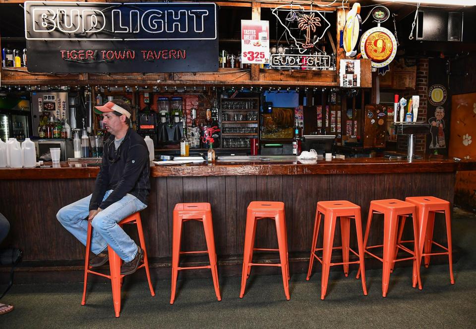 Cameron Farish, co-owner of Tiger Town Tavern in Clemson, S.C., mourns the loss of business from Clemson University during the coronavirus pandemic.