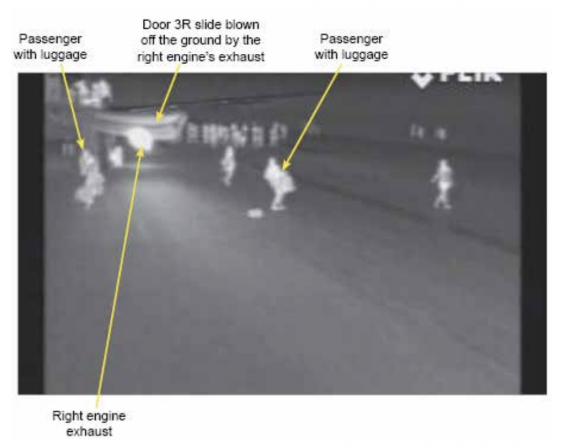 Bad practice: an infra-red photograph of the evacuation scene at Stansted airport in which passengers took cabin baggage off the plane (AAIB)