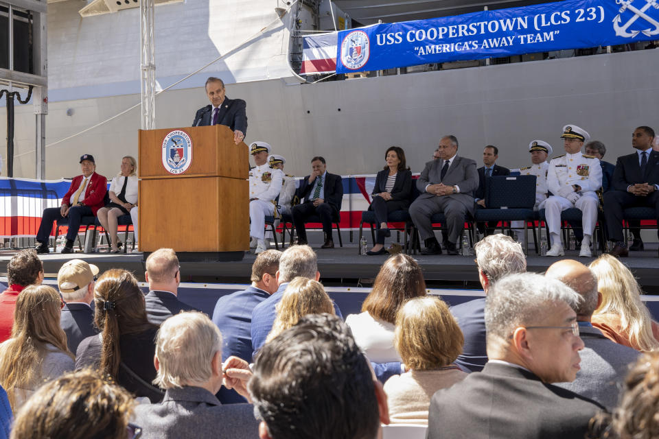 This photo provided by the U.S. Navy shows baseball Hall of Famer Joe Torre speaking during the commissioning ceremony of the Freedom-variant littoral combat ship USS Cooperstown (LCS 23), Saturday, May 6, 2023, in New York. On Saturday, the U.S. Navy commissioned the USS Cooperstown in honor of 70 Major League Baseball Hall of Fame players who served in the military during wartime. (Petty Officer 1st Class Kevin C. Leitner/U.S. Navy via AP)