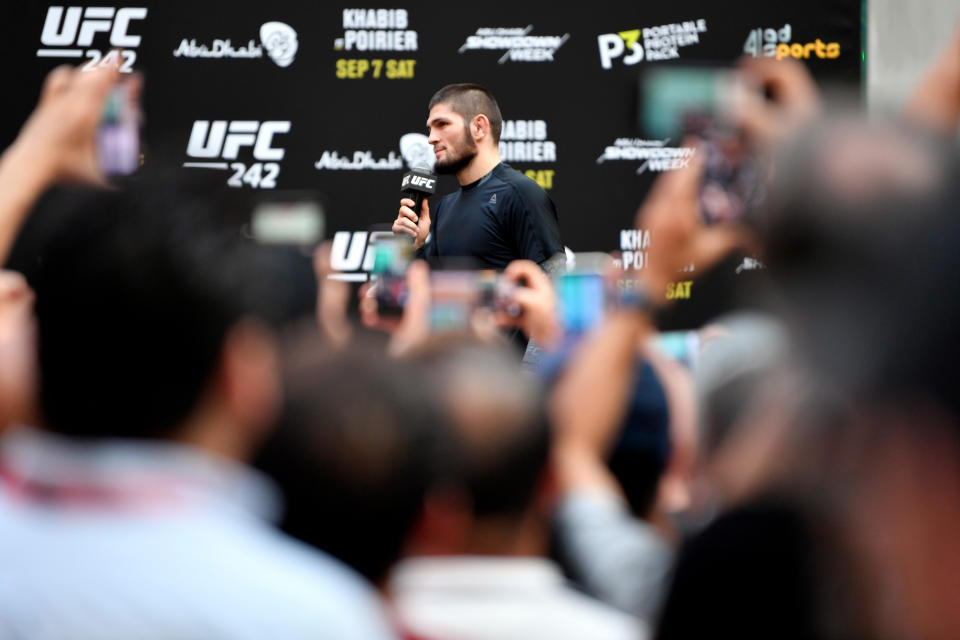 ABU DHABI, UNITED ARAB EMIRATES - SEPTEMBER 04:  Khabib Nurmagomedov of Russia interacts with fans during the UFC 242 Open Workouts at Yas Mall on September 4, 2019 in Abu Dhabi, United Arab Emirates. (Photo by Jeff Bottari/Zuffa LLC/Zuffa LLC via Getty Images)