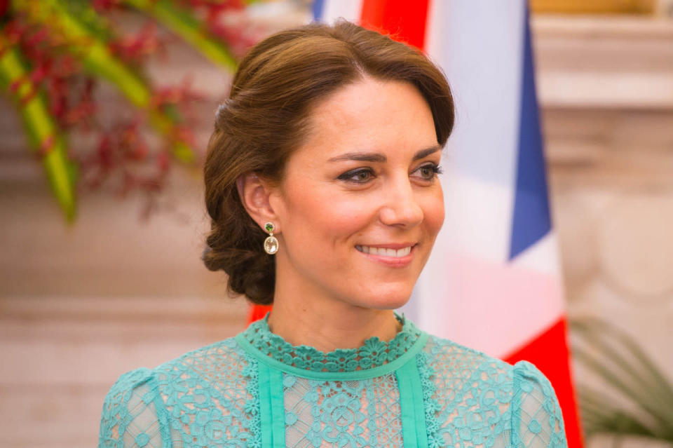 <p>Kate fastened her hair up into a chic chignon for the formal occasion, slipped on a pair of nude pointed heels and accessorised with a subtle pair of drop earrings from luxe London jeweller Kiki McDonough. <i>[Photo: PA Images]</i></p>