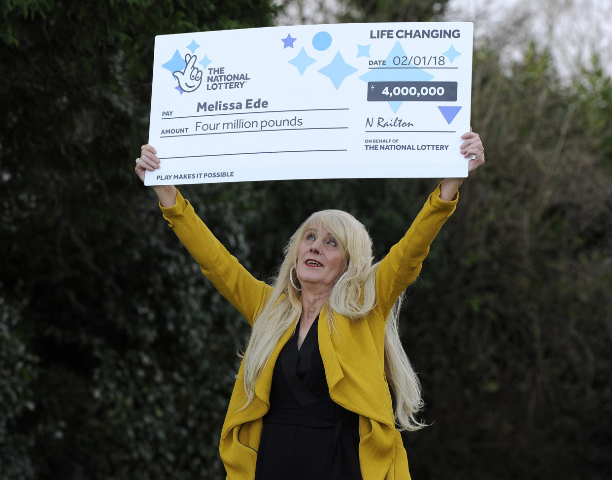 Taxi driver Melissa Ede, 57, celebrating during a photocall at Willerby Manor Hotel in Hull after her &pound;4m Scratchcard win on New Year's Day.