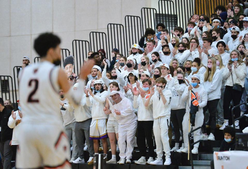 Taunton High student body cheers on the Tigers.