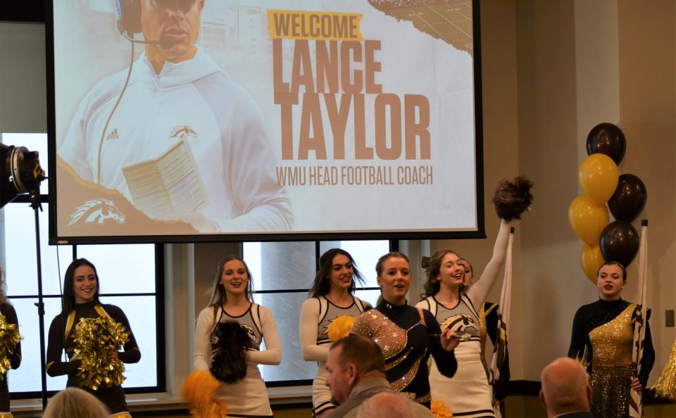 The press conference to introduce new Western Michigan University head football coach Lance Taylor on Friday included the Bronco cheerleaders, the band and the school mascot.