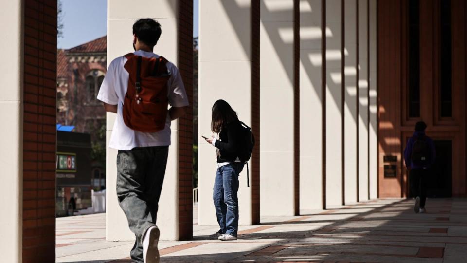 People walk on the campus of the University of Southern California on March 21, 2024 in Los Angeles, California. (Photo by Mario Tama/Getty Images) (Mario Tama/Getty Images)