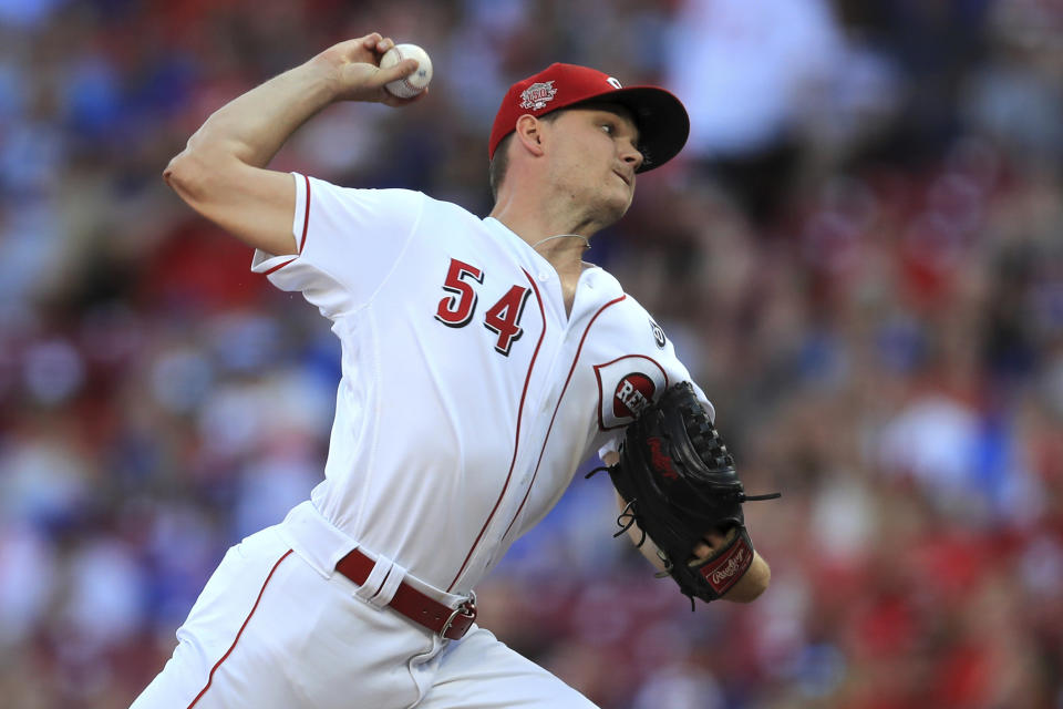 Cincinnati Reds' Sonny Gray throws in the first inning inning of a baseball game against the Chicago Cubs, Saturday, Aug. 10, 2019, in Cincinnati. (AP Photo/Aaron Doster)