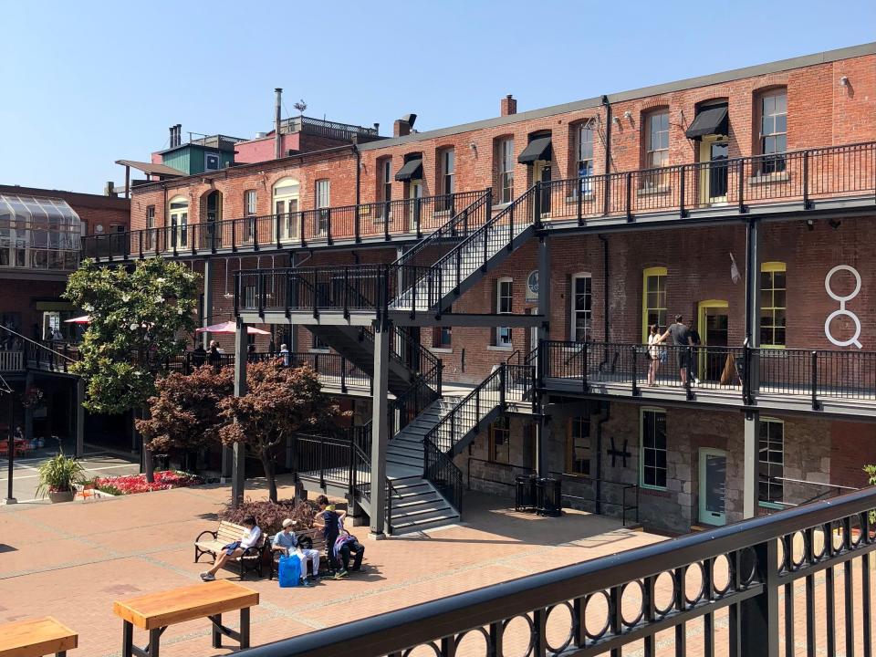 people milling about market square in victoria canada