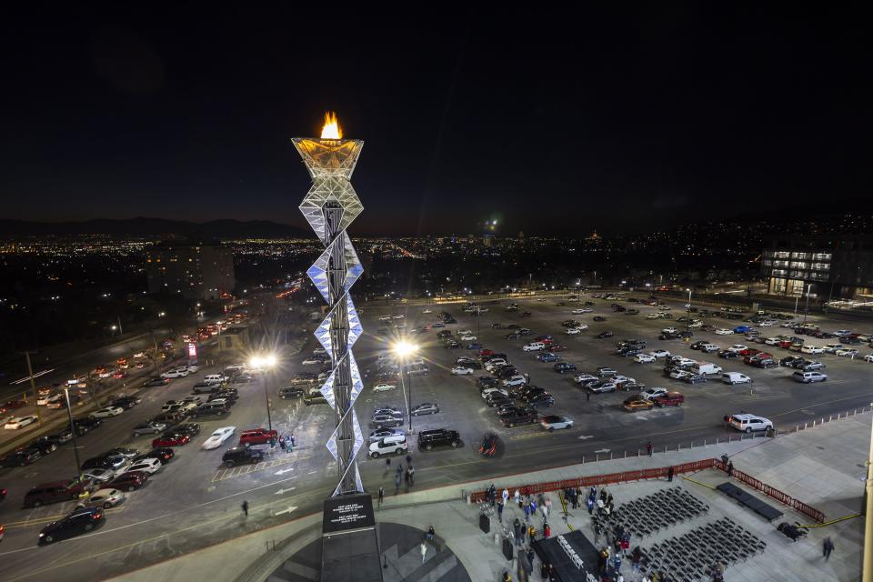 The Olympic Cauldron burns again, marking the 20-year anniversary of the Salt Lake 2002 Olympics opening ceremony at Rice-Eccles Stadium at the University of Utah in Salt Lake City on Tuesday, Feb. 8, 2022. | Scott G Winterton, Deseret News