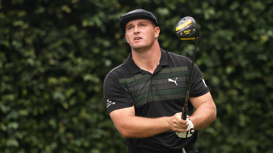 Seen here, Bryson DeChambeau watches a tee shot during his first round at the Masters.