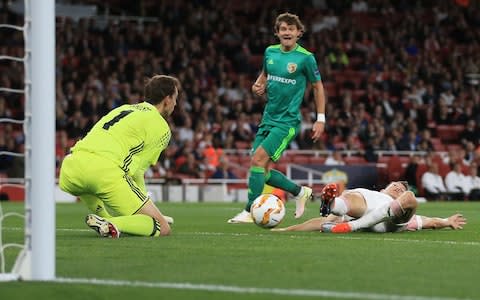 Lichtsteiner slides in to try to convert Torreira's diagonal pass but had jumped the gun - Credit:  Marc Atkins/Getty Images