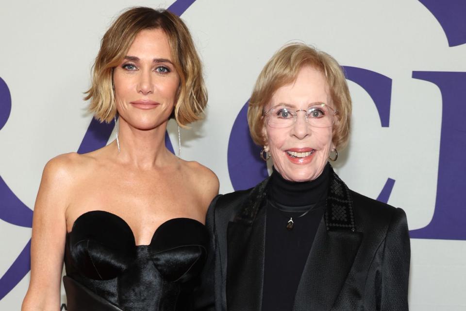 <p>Amy Sussman/Getty</p> Kristen Wiig and Carol Burnett attend The Alliance For Women In Media Foundation