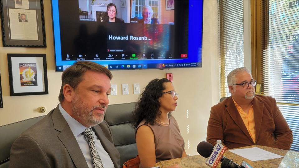 Attorney John Phillips (left) speaks about the lawsuit filed by Yusela Machado Silvente (center) and  Joel Alfaro with co-counsels Mary Vargas and  Marc Charmatz of the National Association of the Deaf on the screen during Tuesday's videoconference.