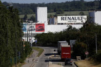 FILE - In this May 25, 2020 file photo, the Flins plant of French carmaker Renault is pictured in Aubergenville, west of Paris. French carmaker Renault announced 15,000 job cuts worldwide as part of a 2 billion euros cost-cutting plan over three years. Renault said on Friday that nearly 4,600 jobs would be cut in France in addition to more than 10,000 in the rest of the world. (AP Photo/Christophe Ena, File)