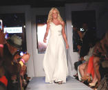 Kate Gosselin can add runway model to her resumé. The former reality TV star made her New York Fashion Week debut on Sept. 12 at the 'Real Fashion, Real Women' runway show benefitting the Bottomless Closet, which provides women in need with clothes to help them enter and succeed in the workforce. The mom of eight looked healty, toned and tanned in a one-shoulder white gown. (Photo by Taylor Hill/Getty Images)